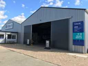Online veiling Complete loodsen met onder andere stalen, houten constructies en heftrucks