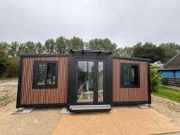 Online-Versteigerung Tinyhouses, containers, opslagtenten en machines
