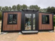 Online veiling Tinyhouses, containers, opslagtenten, werkbanken en hekwerk