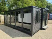 Online auction Tinyhouses, containers, opslagtenten, werkbanken en machines